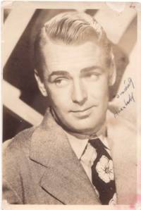 Sepiatone photo of Alan Ladd as a young actor, signed in blue ink: "Sincerely / Alan Ladd Sepiatone photo of Alan Ladd as a young actor, signed in blue ink: "Sincerely / Alan Ladd