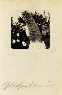 Real photo vignette postcard of a girl with long hair, captioned in contemporary pencil, "Gladys Hair