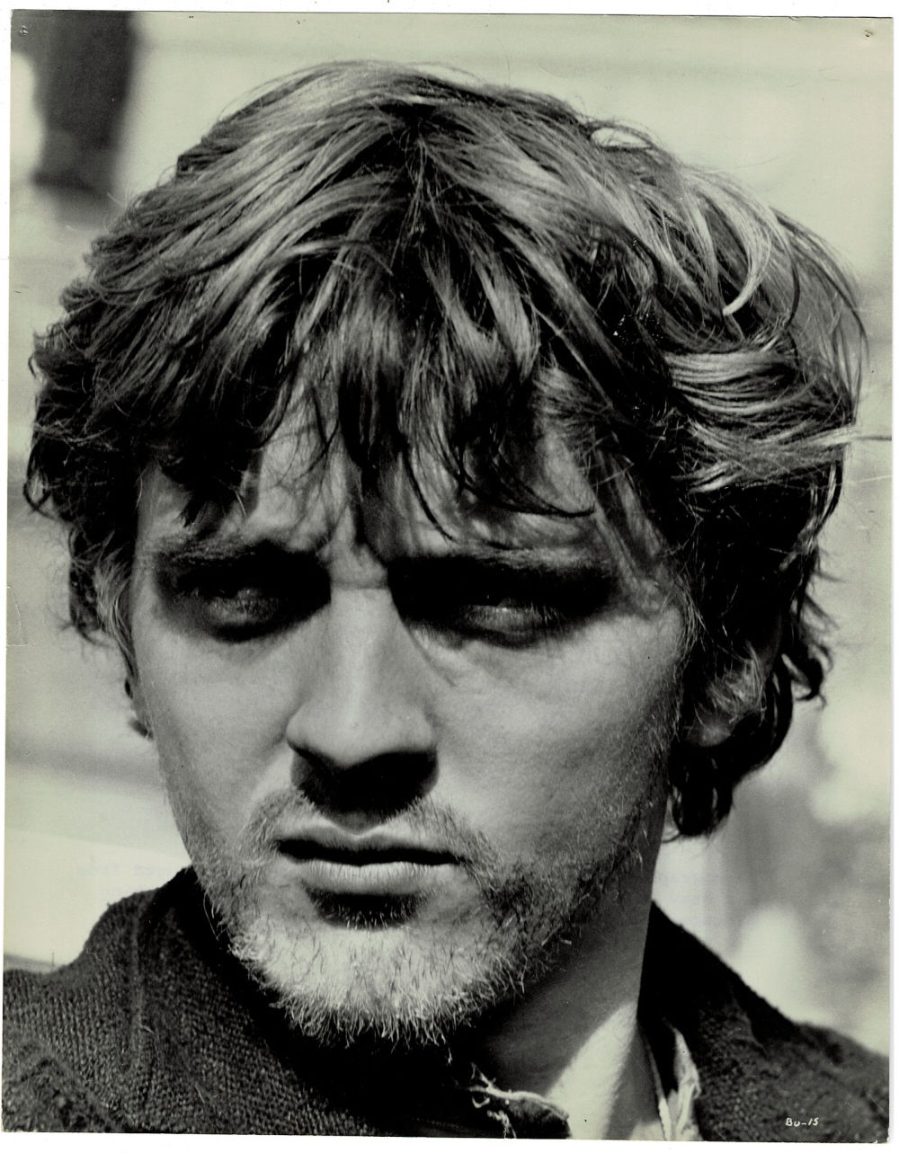 AN ORIGINAL BLACK & WHITE MOVIE STILL portraying DAVID HEMMINGS in a scene from Antonioni's BLOW-UP.
